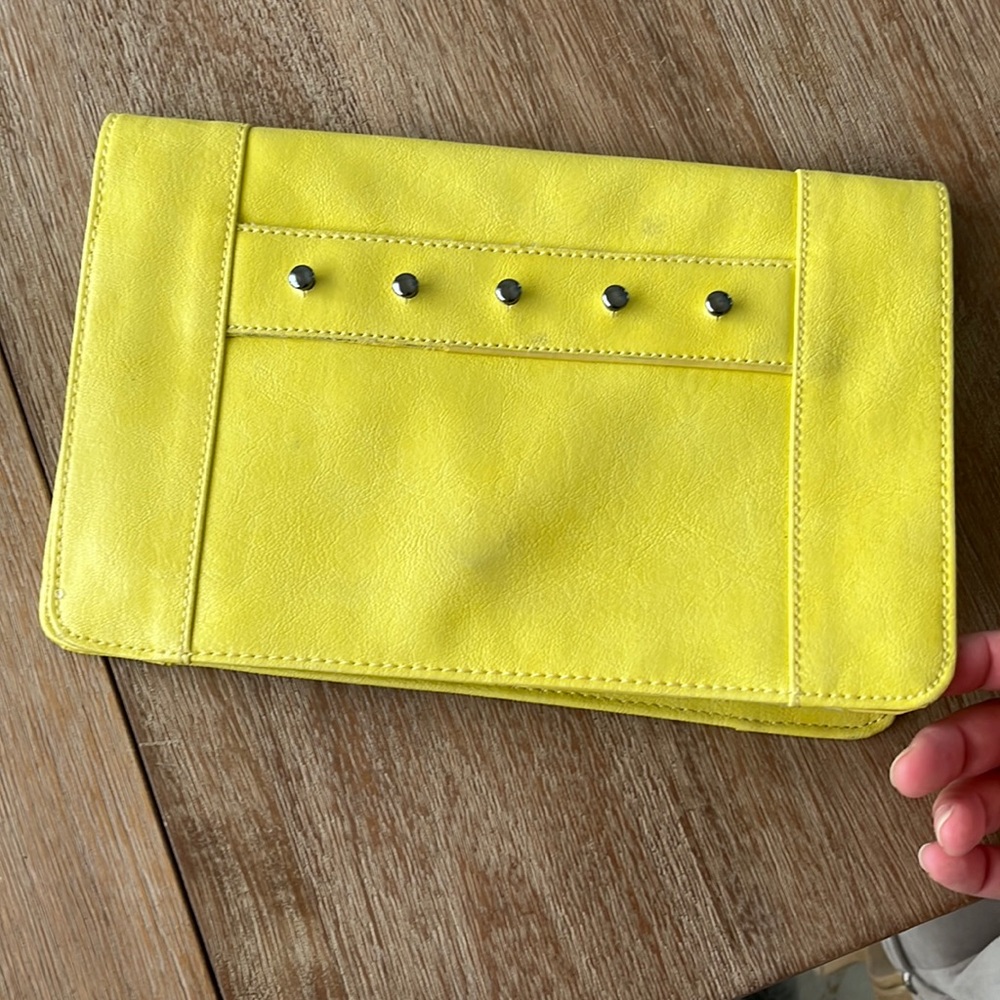 BCBG GENERATION YELLOW CLUTCH. Good condition.